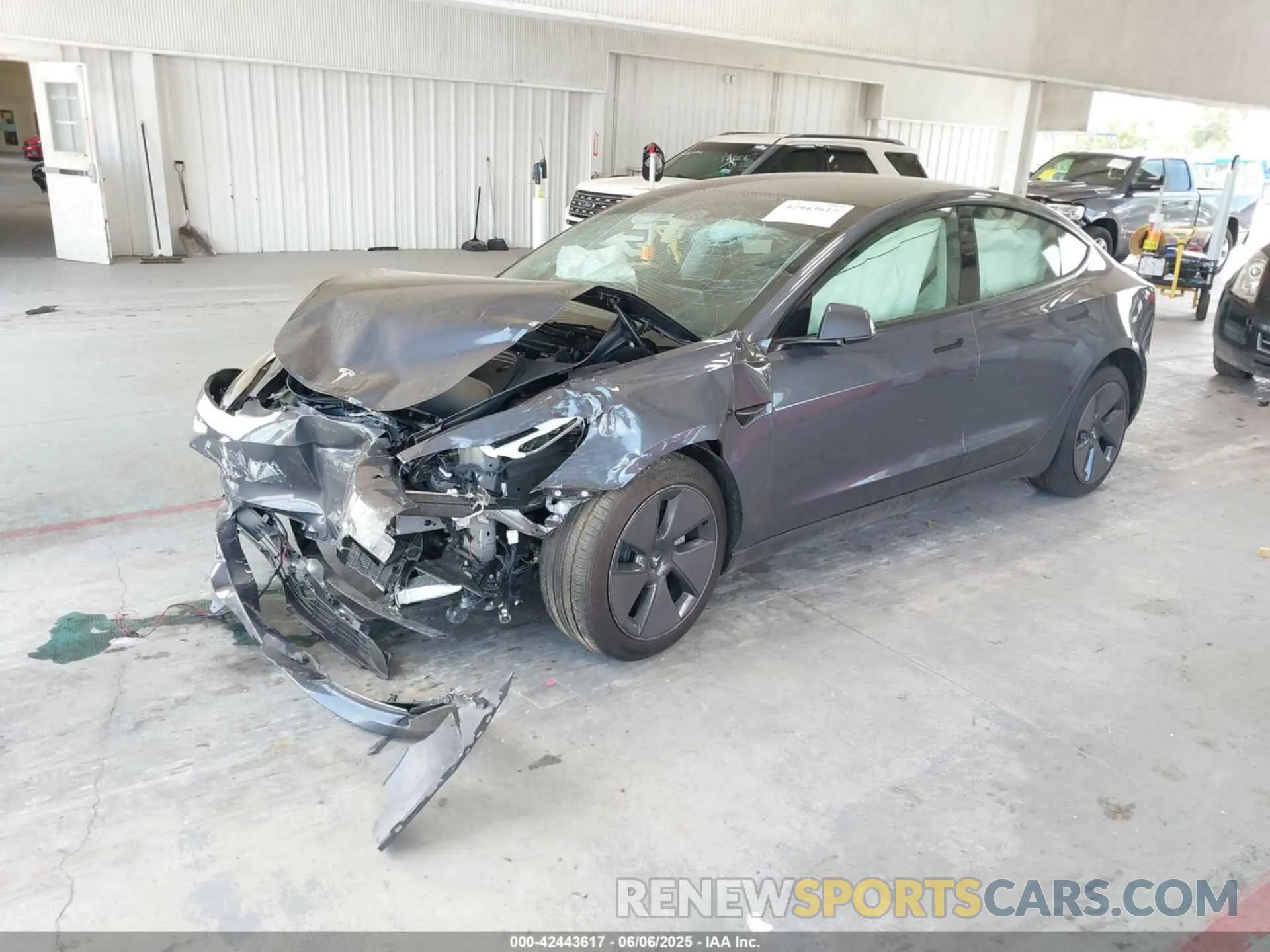 2 fotografías del automóvil dañado 5YJ3E1EA3PF618866 TESLA MODEL 3 2023