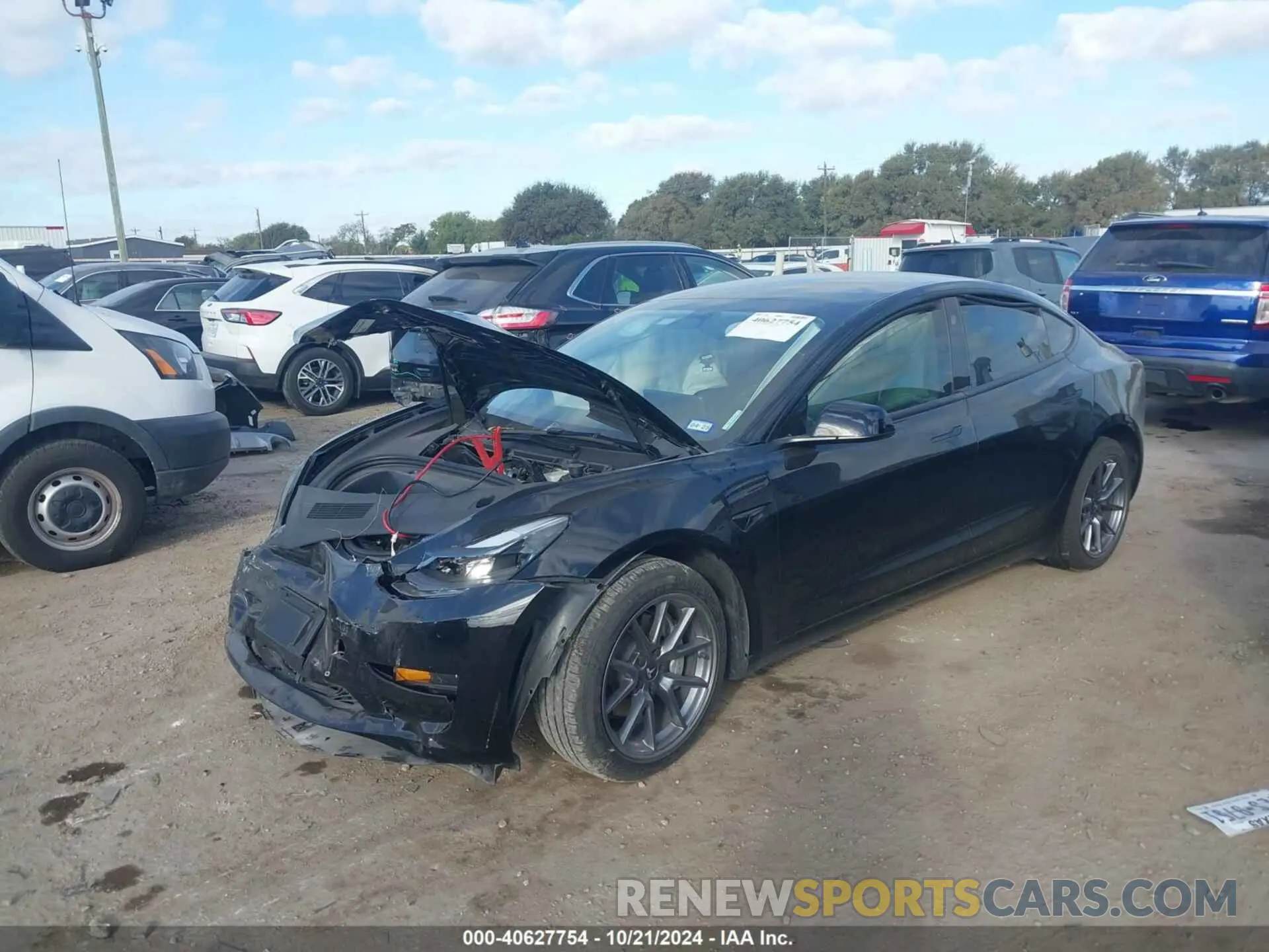 2 fotografías del automóvil dañado 5YJ3E1EA3PF668439 TESLA MODEL 3 2023