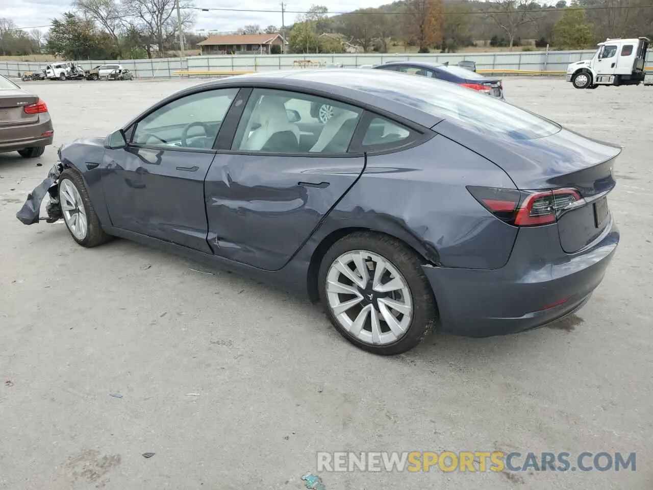 2 fotografías del automóvil dañado 5YJ3E1EA3PF670577 TESLA MODEL 3 2023