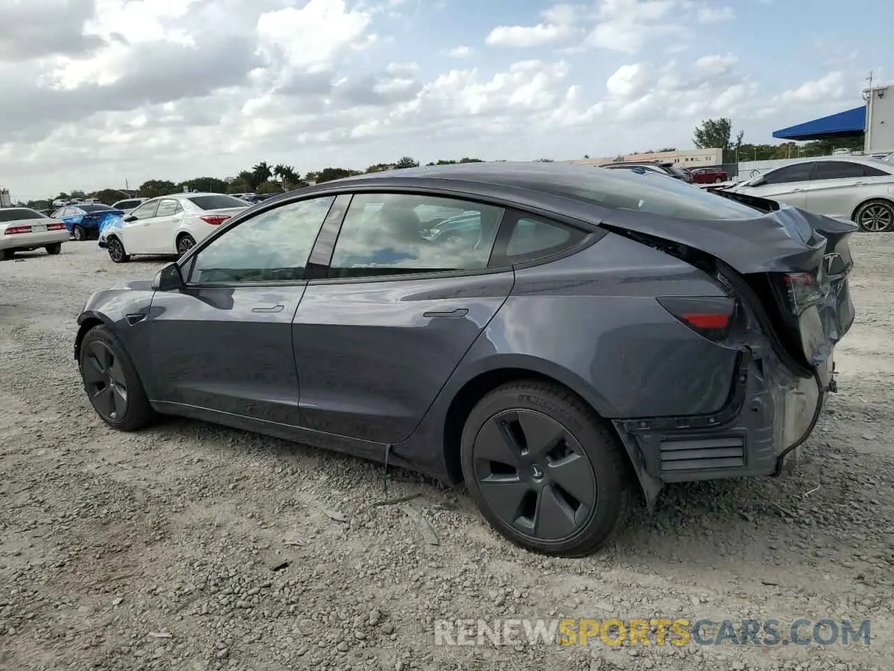 2 fotografías del automóvil dañado 5YJ3E1EA3PF690103 TESLA MODEL 3 2023
