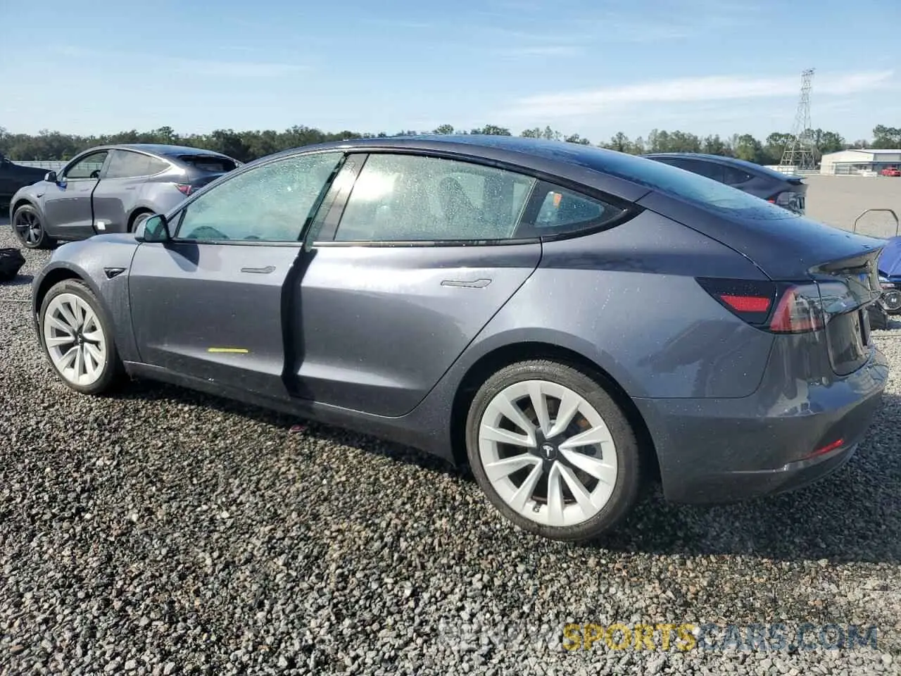 2 fotografías del automóvil dañado 5YJ3E1EA3PF692630 TESLA MODEL 3 2023