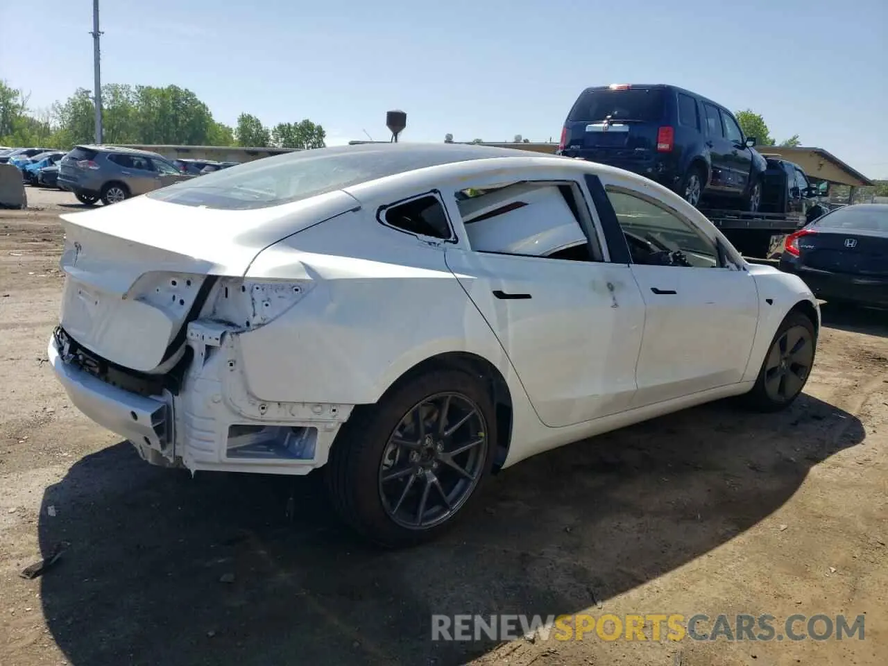 3 fotografías del automóvil dañado 5YJ3E1EA4PF398301 TESLA MODEL 3 2023