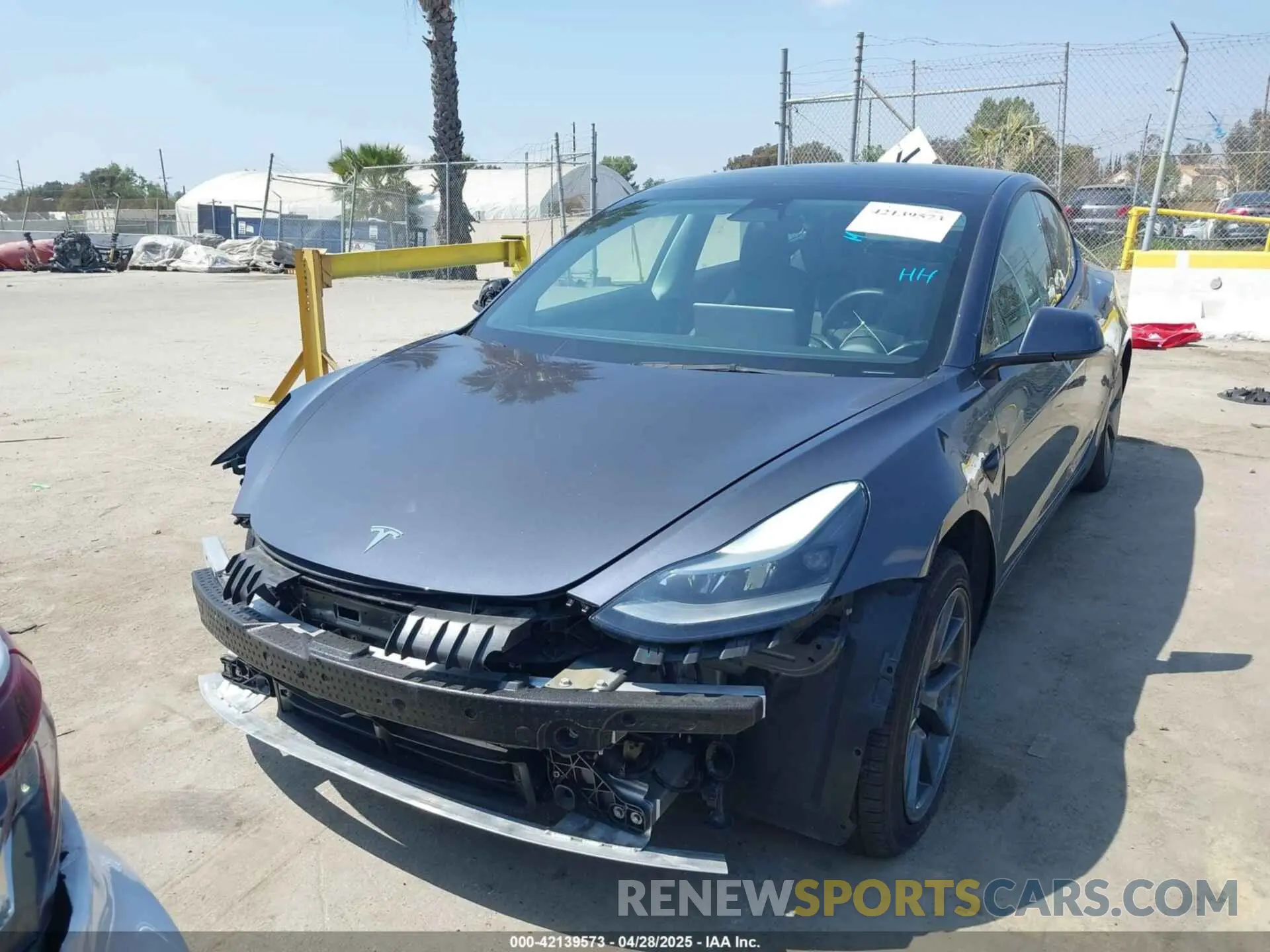 2 fotografías del automóvil dañado 5YJ3E1EA4PF398573 TESLA MODEL 3 2023