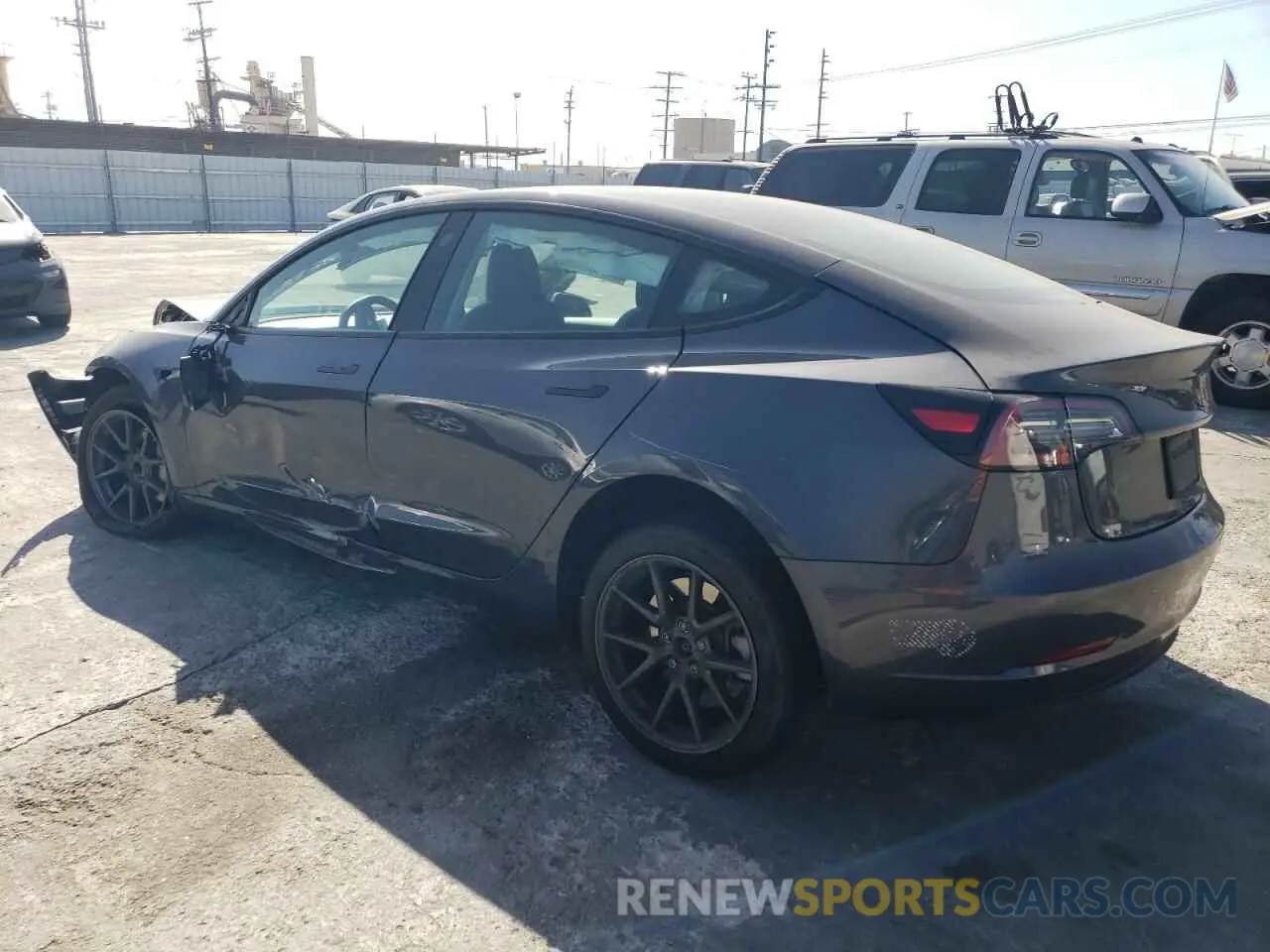 2 fotografías del automóvil dañado 5YJ3E1EA4PF413699 TESLA MODEL 3 2023