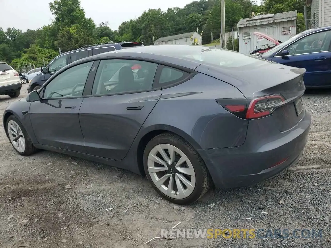 2 fotografías del automóvil dañado 5YJ3E1EA4PF465172 TESLA MODEL 3 2023