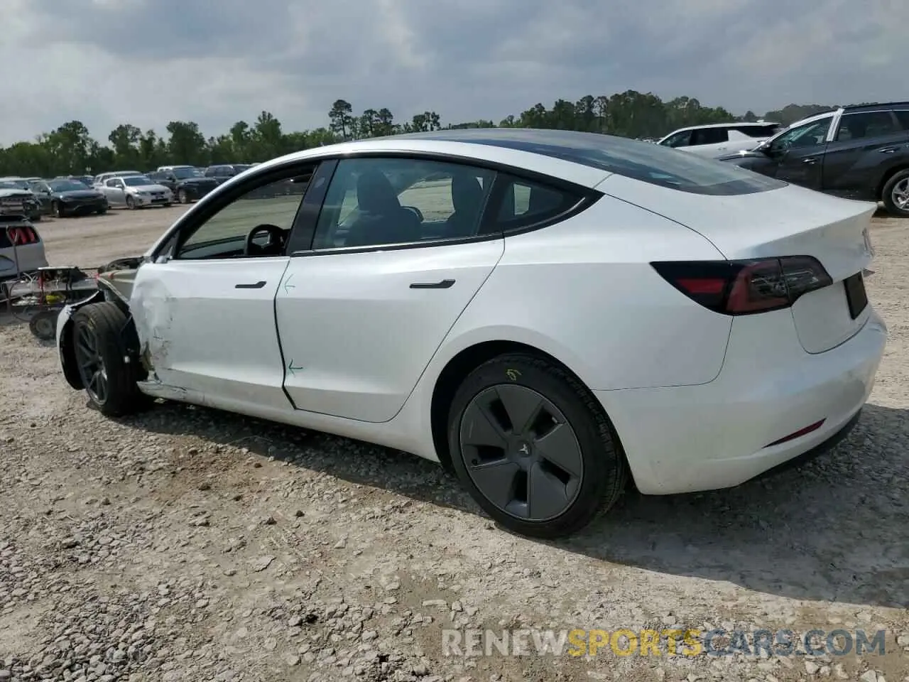 2 fotografías del automóvil dañado 5YJ3E1EA4PF547466 TESLA MODEL 3 2023