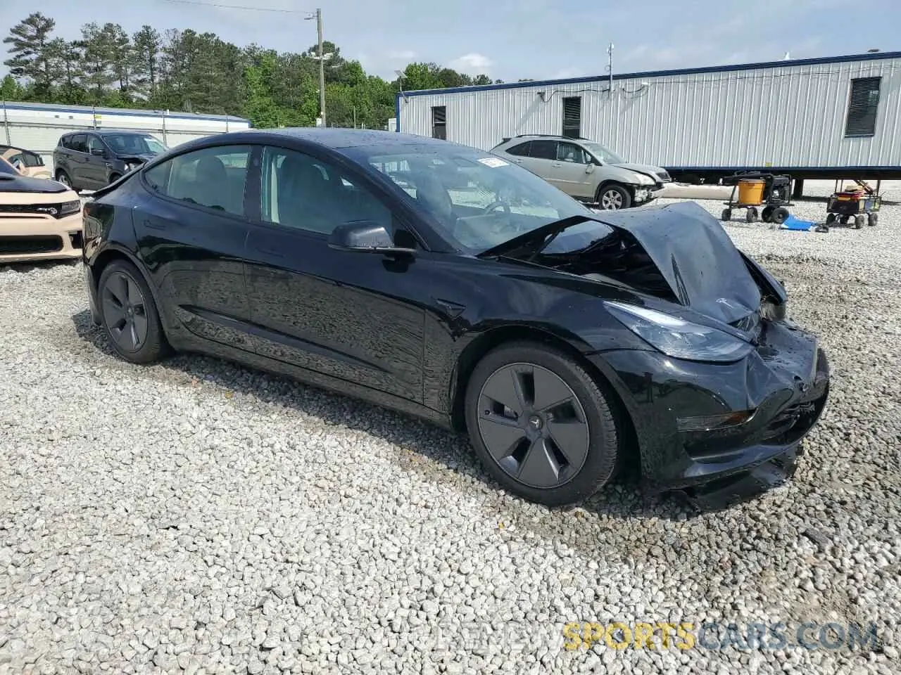 4 fotografías del automóvil dañado 5YJ3E1EA4PF559424 TESLA MODEL 3 2023