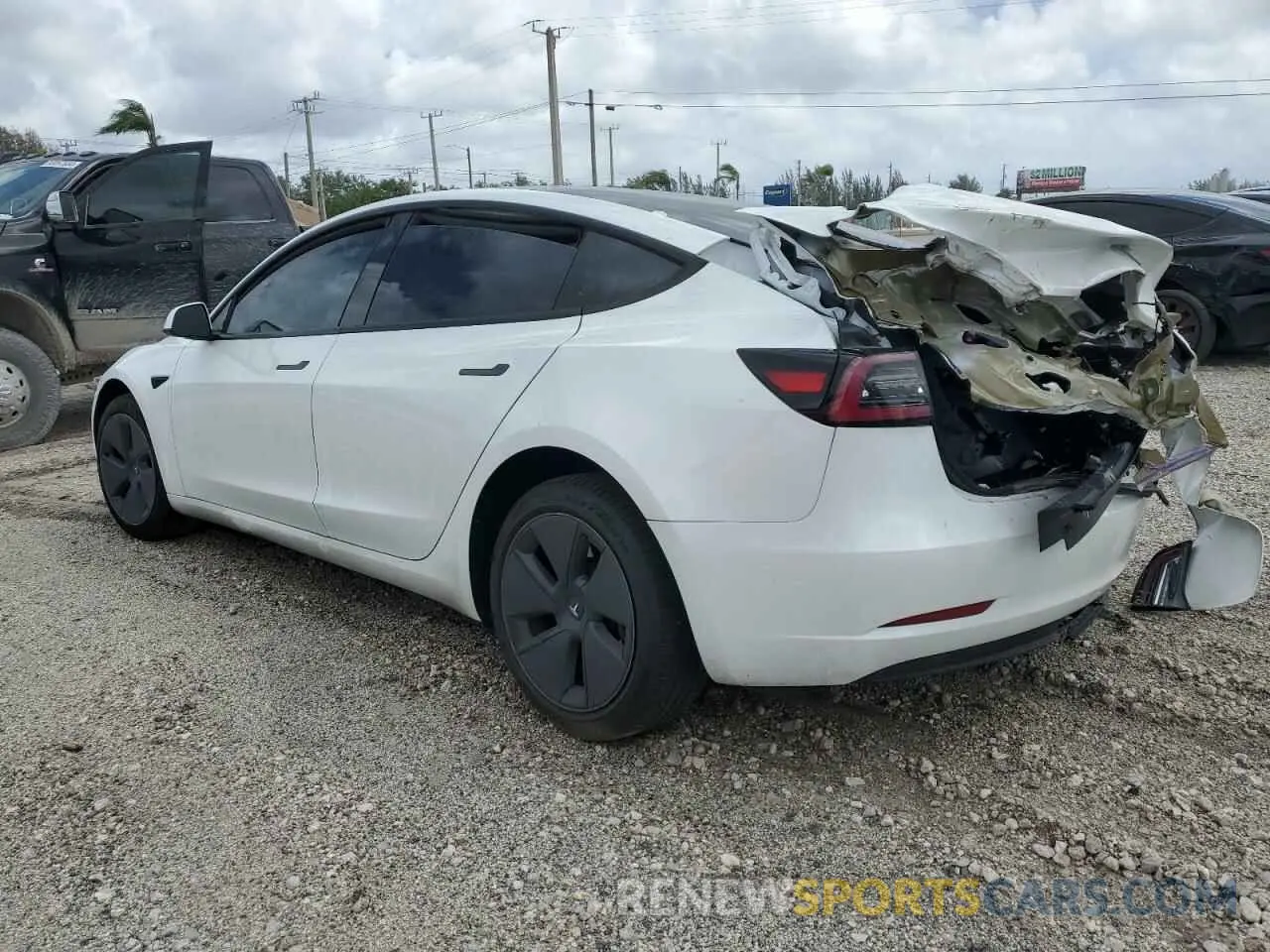 2 fotografías del automóvil dañado 5YJ3E1EA4PF567345 TESLA MODEL 3 2023