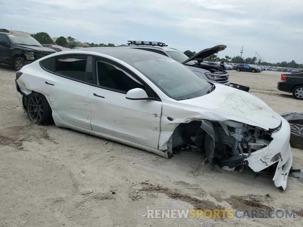 4 fotografías del automóvil dañado 5YJ3E1EA4PF567345 TESLA MODEL 3 2023