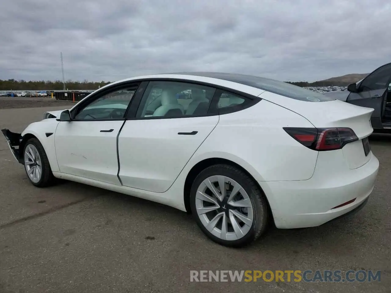 2 fotografías del automóvil dañado 5YJ3E1EA4PF569399 TESLA MODEL 3 2023