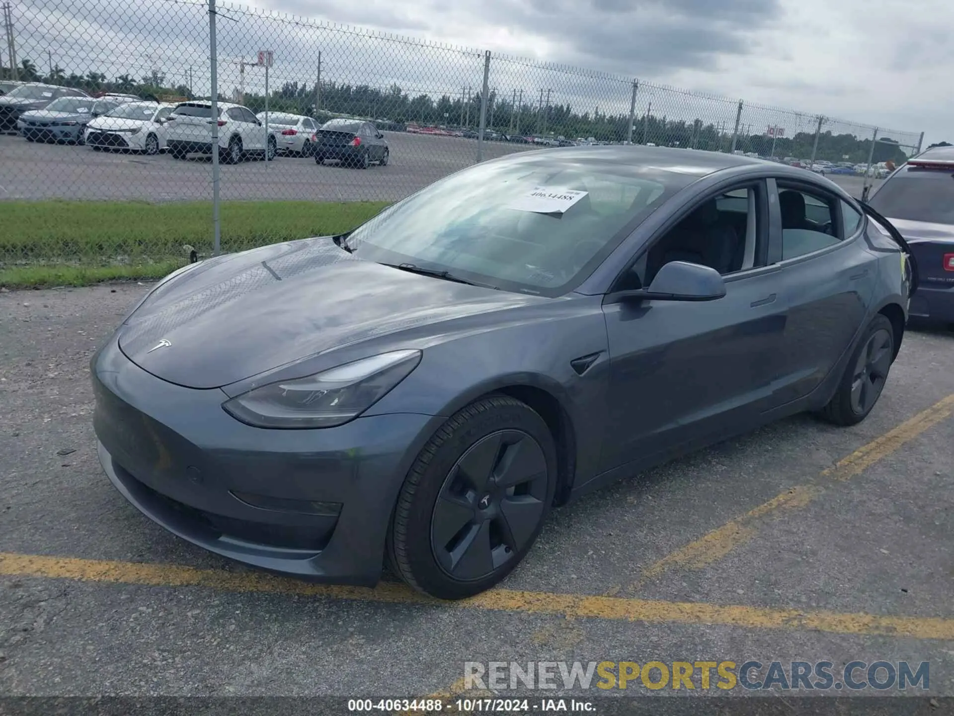 2 fotografías del automóvil dañado 5YJ3E1EA4PF570469 TESLA MODEL 3 2023