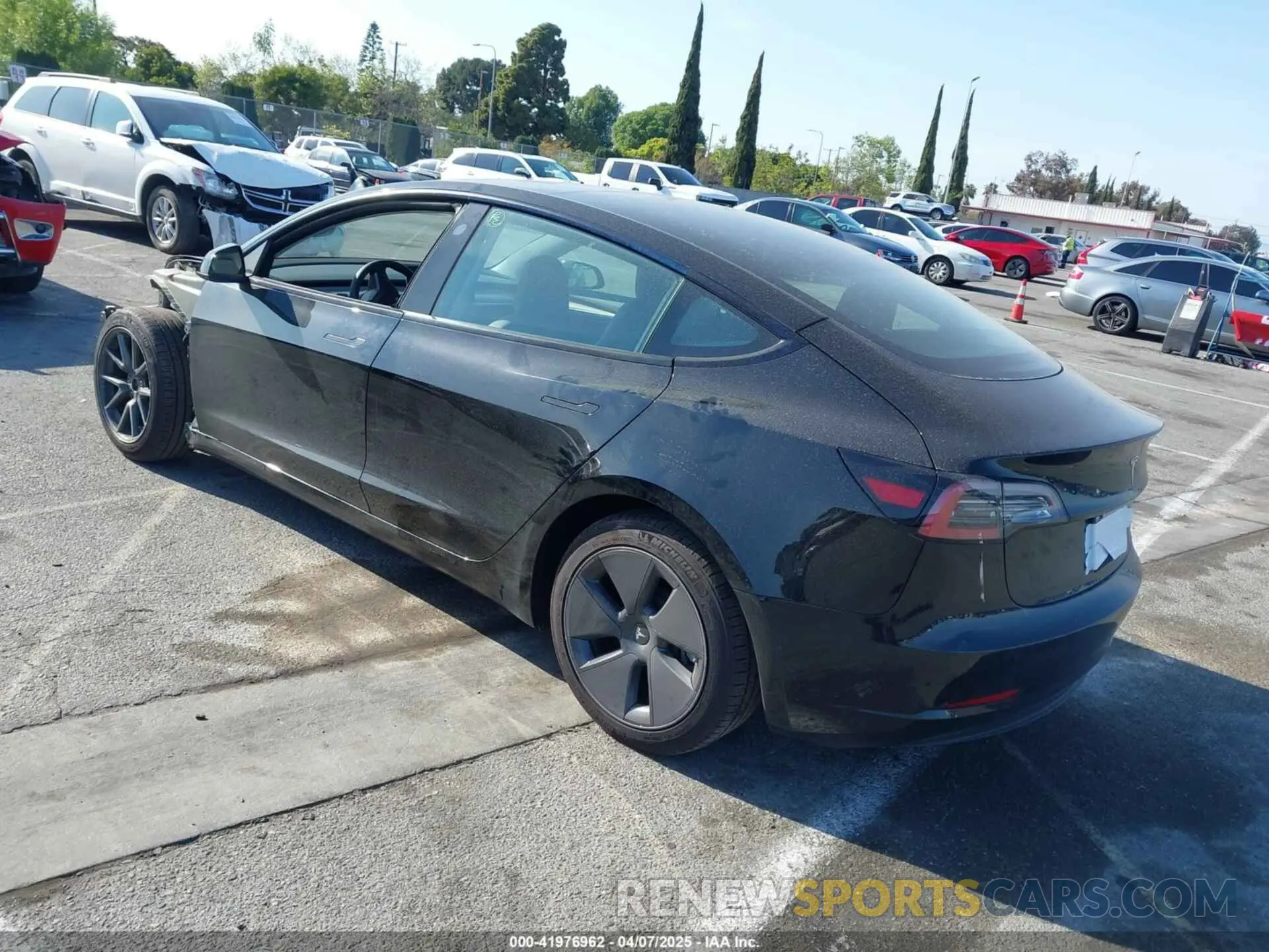 3 fotografías del automóvil dañado 5YJ3E1EA4PF571895 TESLA MODEL 3 2023