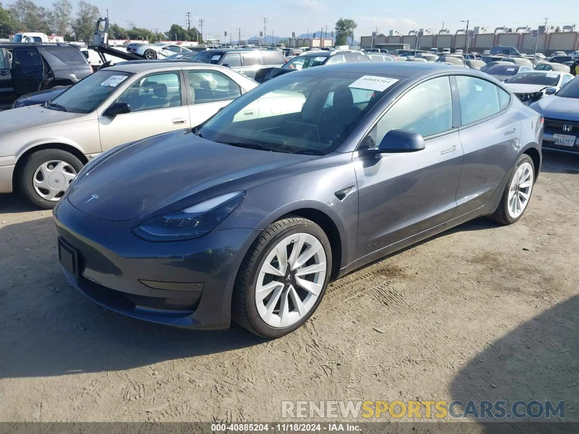 2 fotografías del automóvil dañado 5YJ3E1EA4PF573632 TESLA MODEL 3 2023