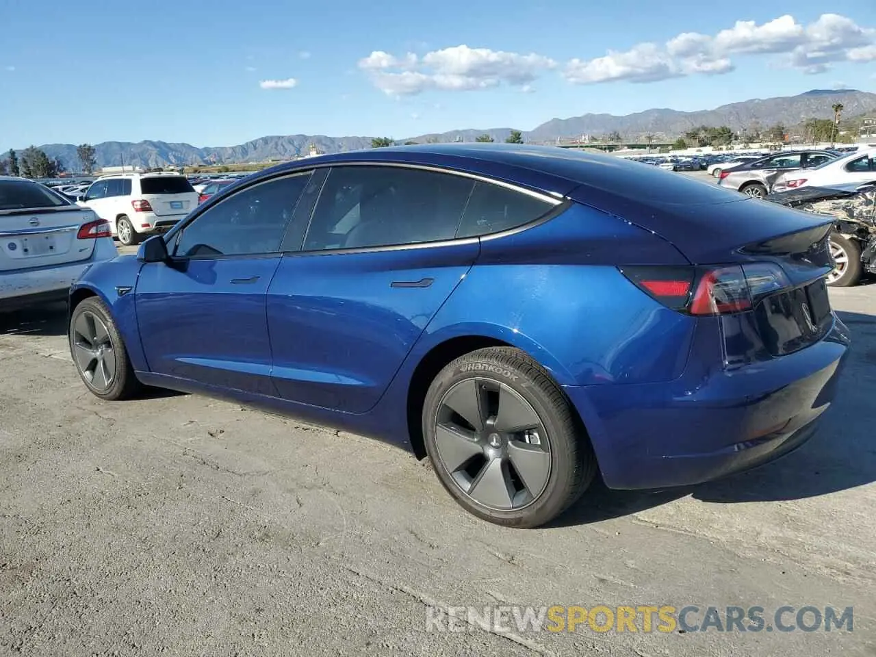 2 fotografías del automóvil dañado 5YJ3E1EA4PF590415 TESLA MODEL 3 2023