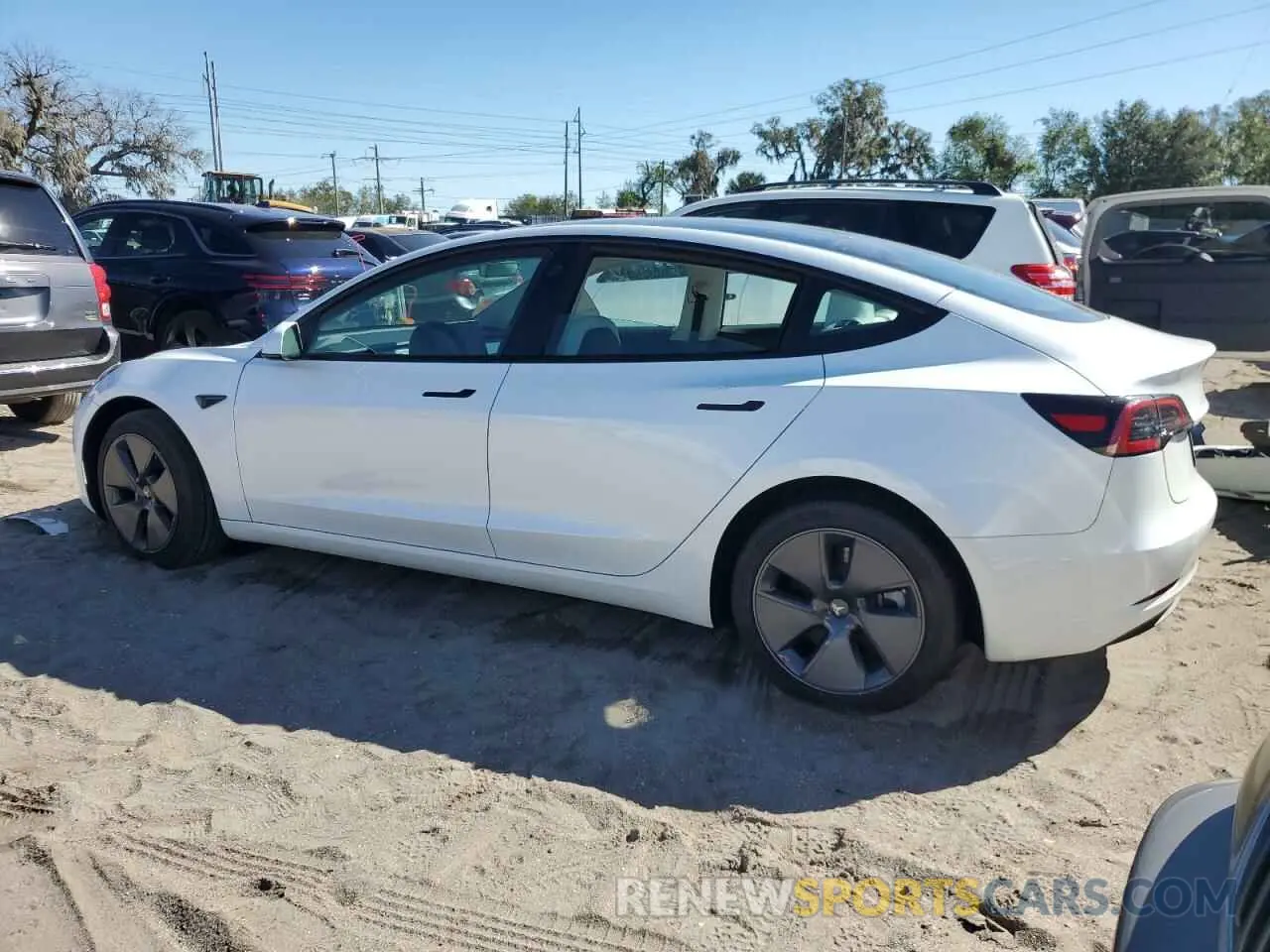 2 fotografías del automóvil dañado 5YJ3E1EA4PF594495 TESLA MODEL 3 2023