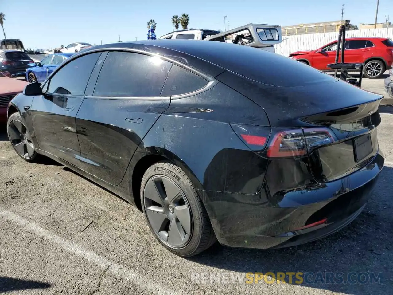 2 fotografías del automóvil dañado 5YJ3E1EA4PF706521 TESLA MODEL 3 2023