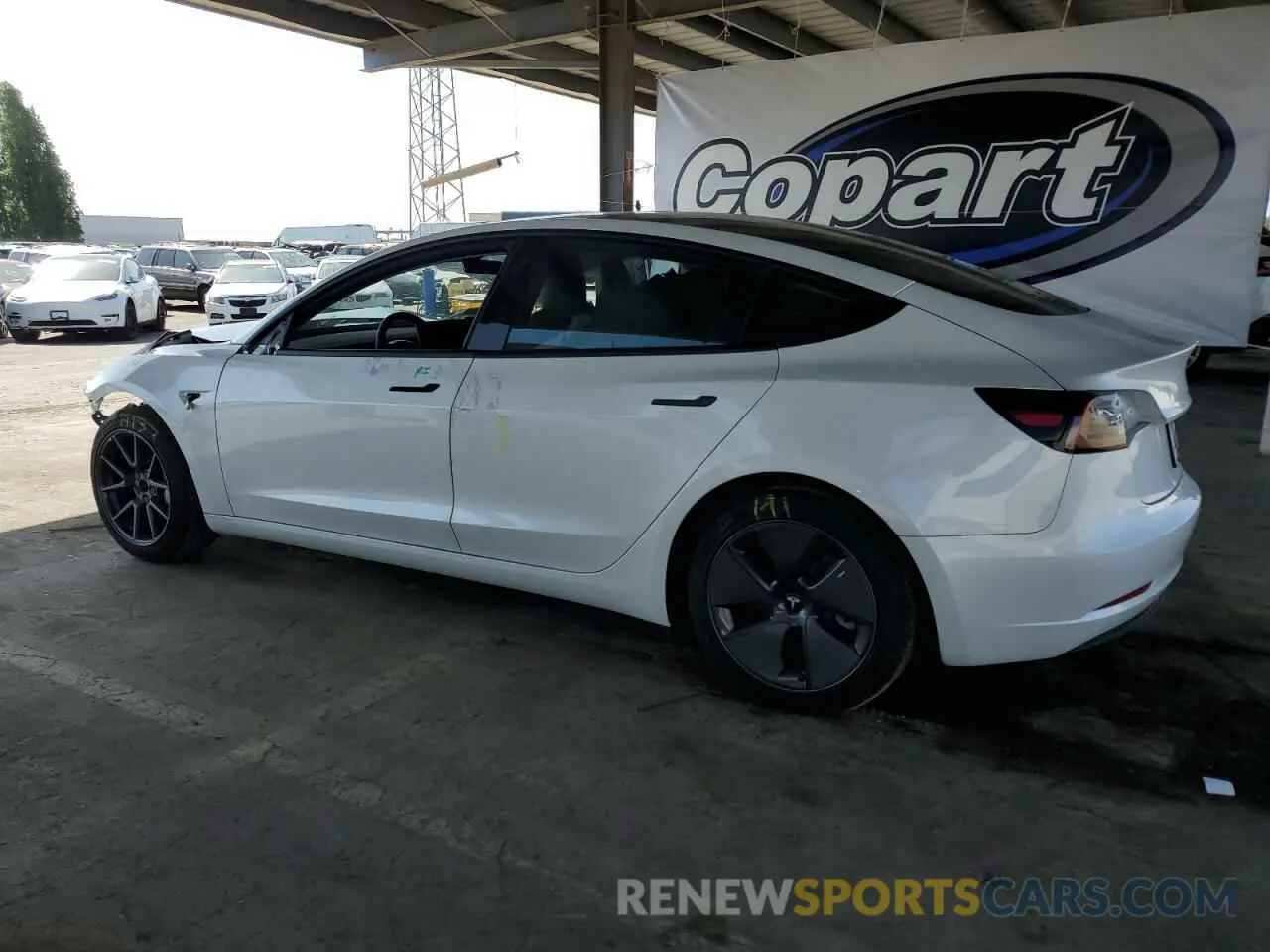 2 fotografías del automóvil dañado 5YJ3E1EA5PF400282 TESLA MODEL 3 2023