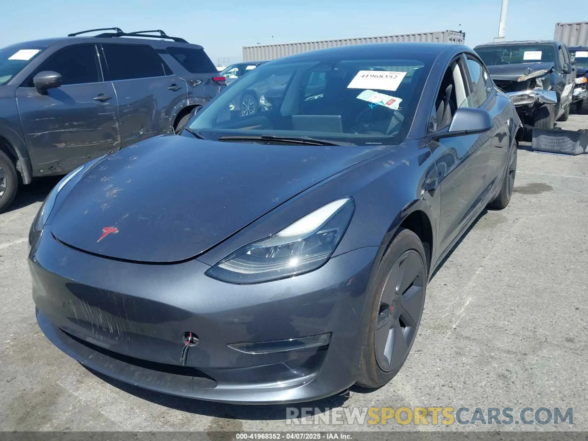 2 fotografías del automóvil dañado 5YJ3E1EA5PF401299 TESLA MODEL 3 2023
