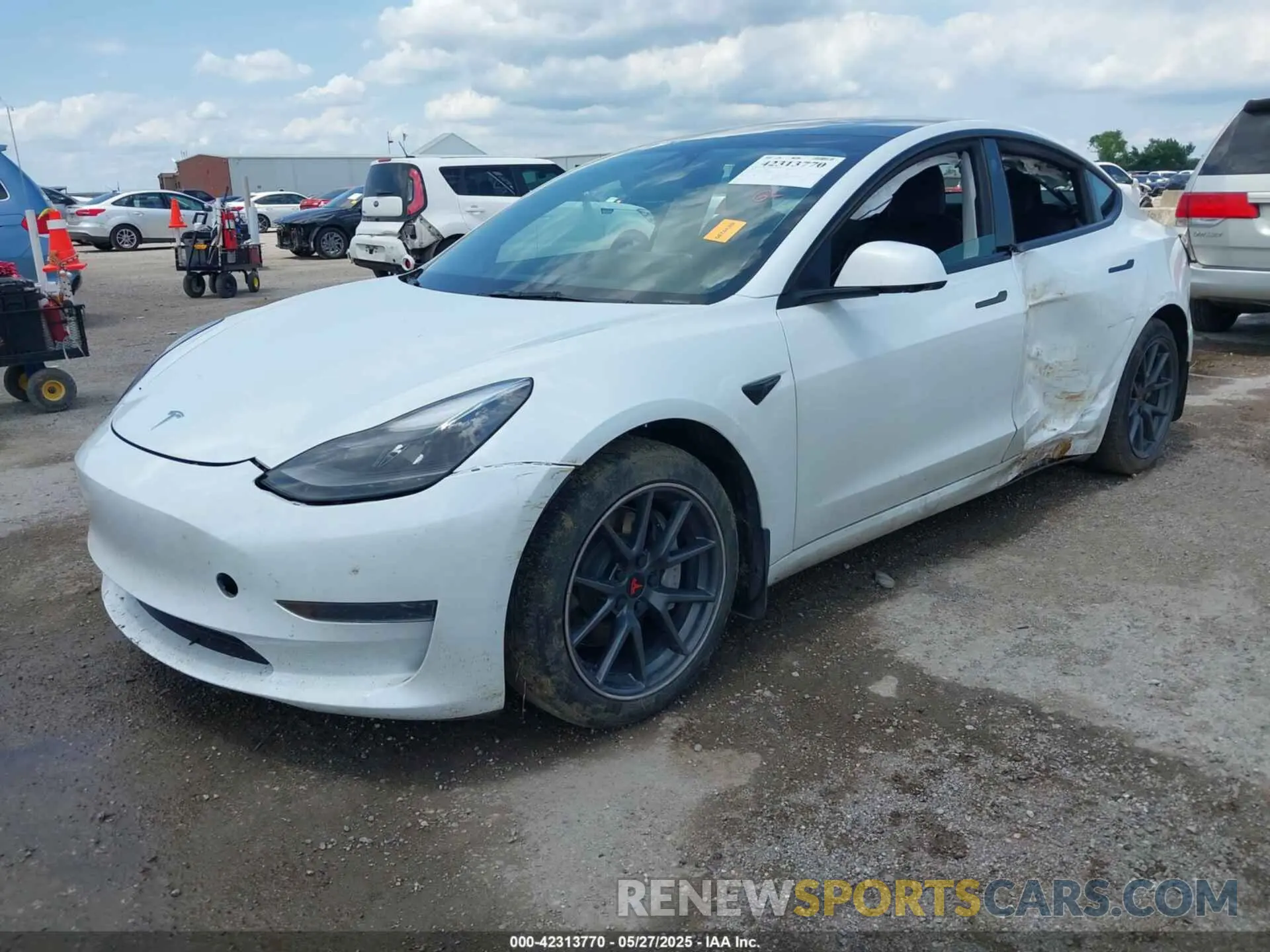 2 fotografías del automóvil dañado 5YJ3E1EA5PF407054 TESLA MODEL 3 2023