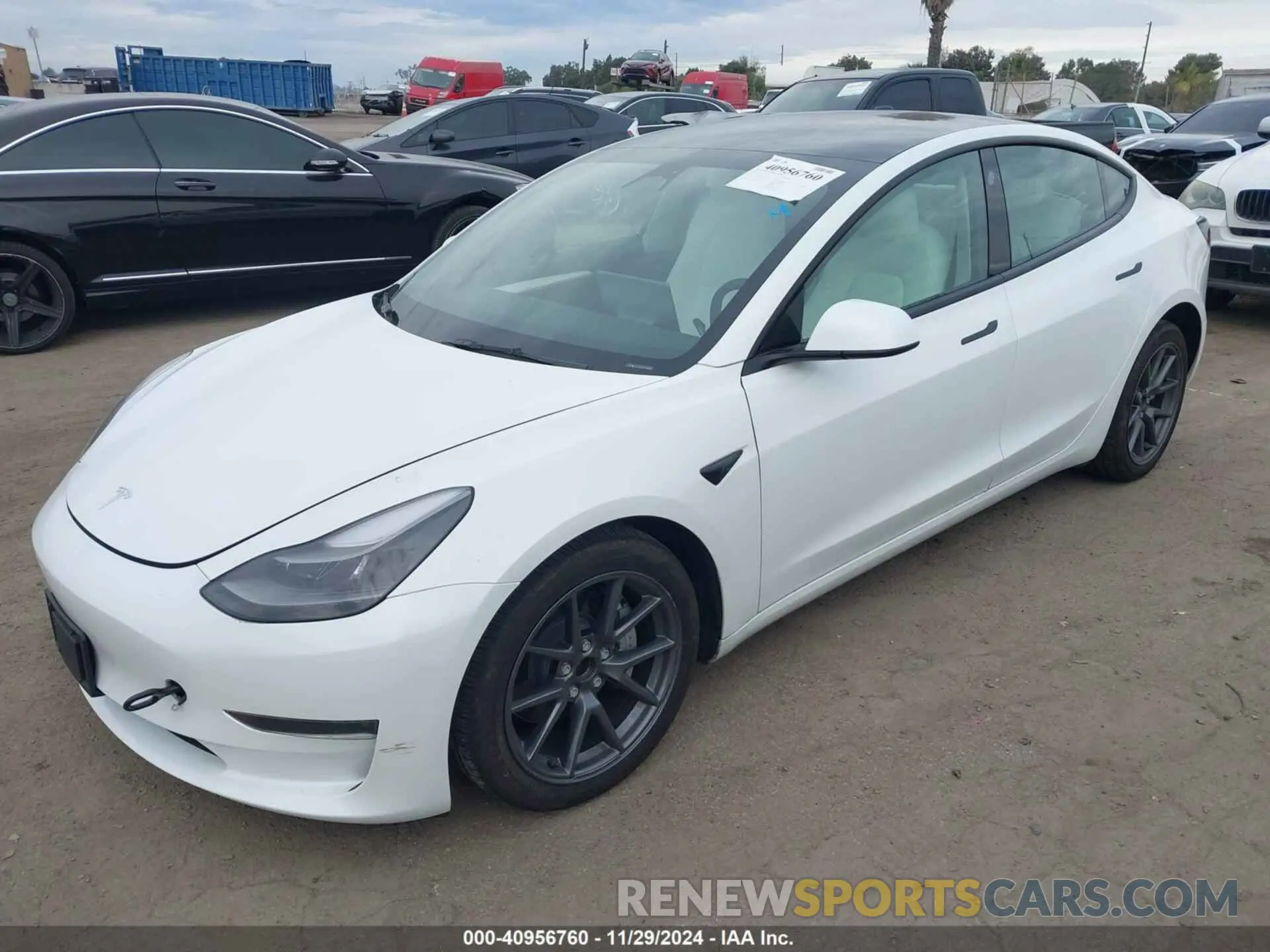 2 fotografías del automóvil dañado 5YJ3E1EA5PF426798 TESLA MODEL 3 2023