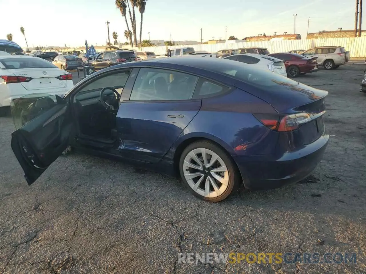 2 fotografías del automóvil dañado 5YJ3E1EA5PF449448 TESLA MODEL 3 2023