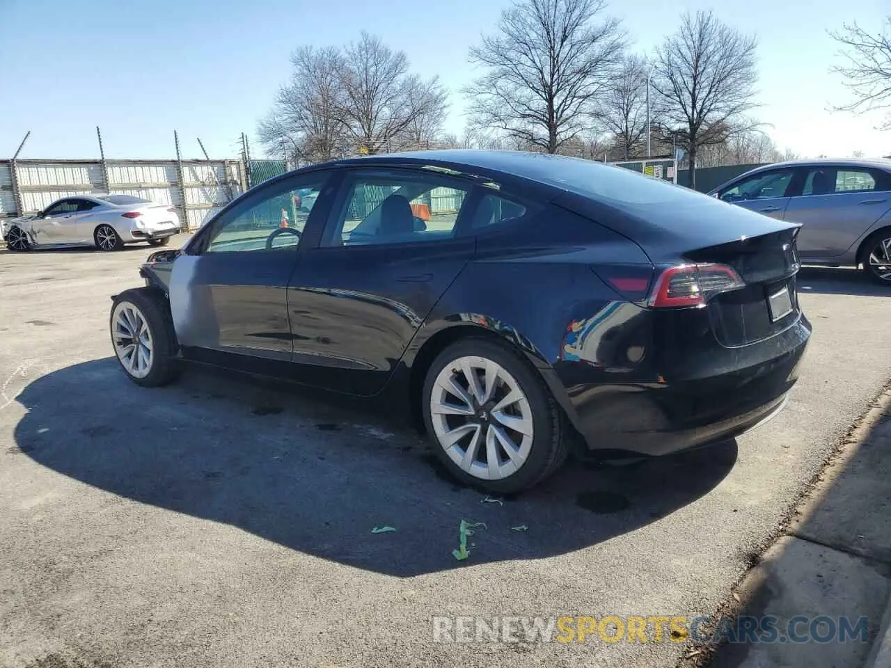 2 fotografías del automóvil dañado 5YJ3E1EA5PF452074 TESLA MODEL 3 2023