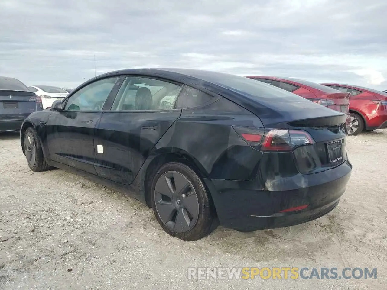 2 fotografías del automóvil dañado 5YJ3E1EA5PF452401 TESLA MODEL 3 2023