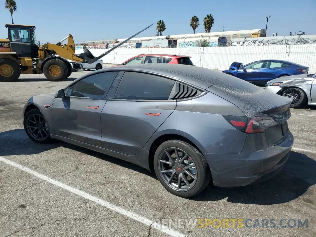 2 fotografías del automóvil dañado 5YJ3E1EA5PF497371 TESLA MODEL 3 2023