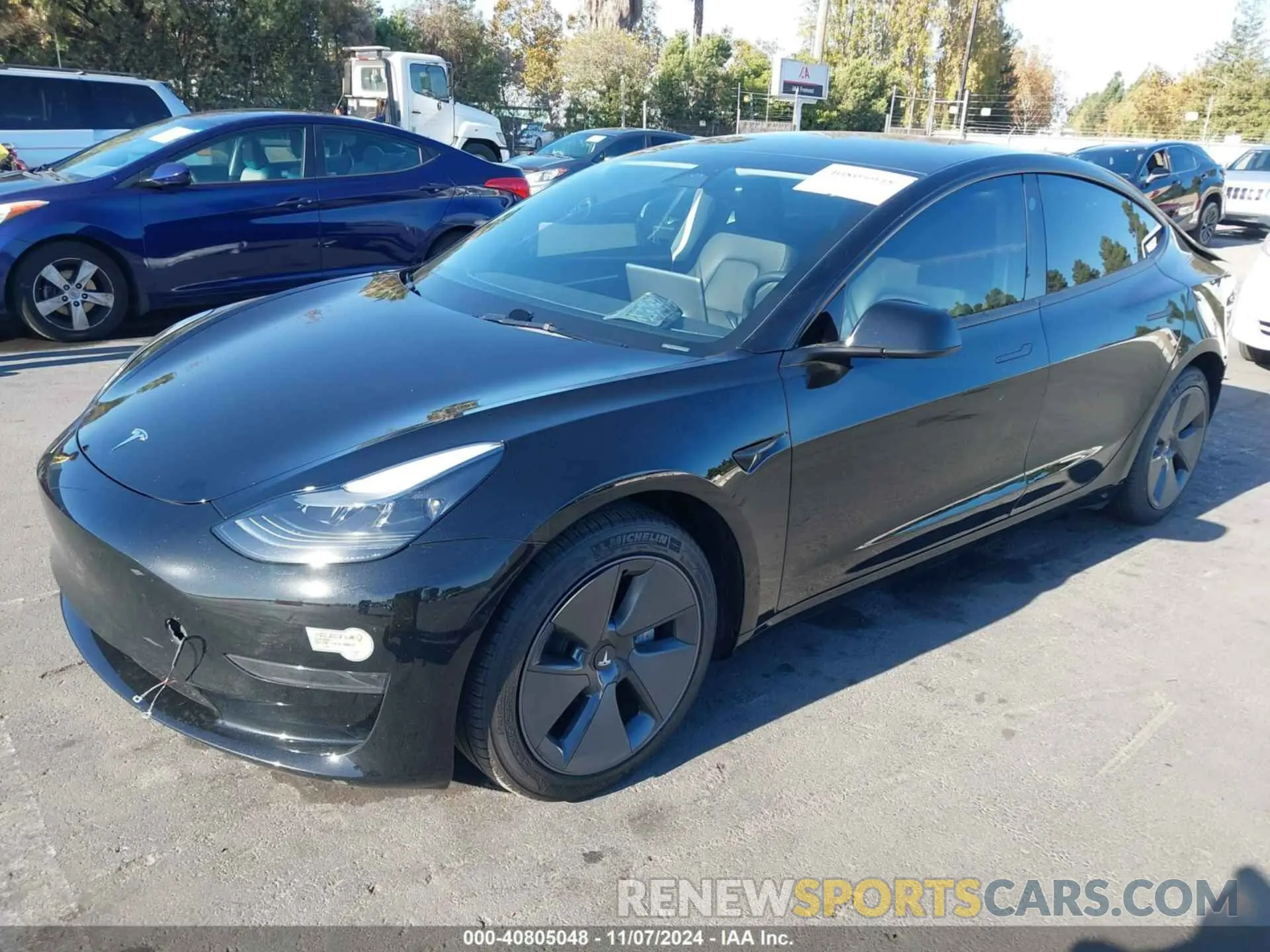 2 fotografías del automóvil dañado 5YJ3E1EA5PF546035 TESLA MODEL 3 2023