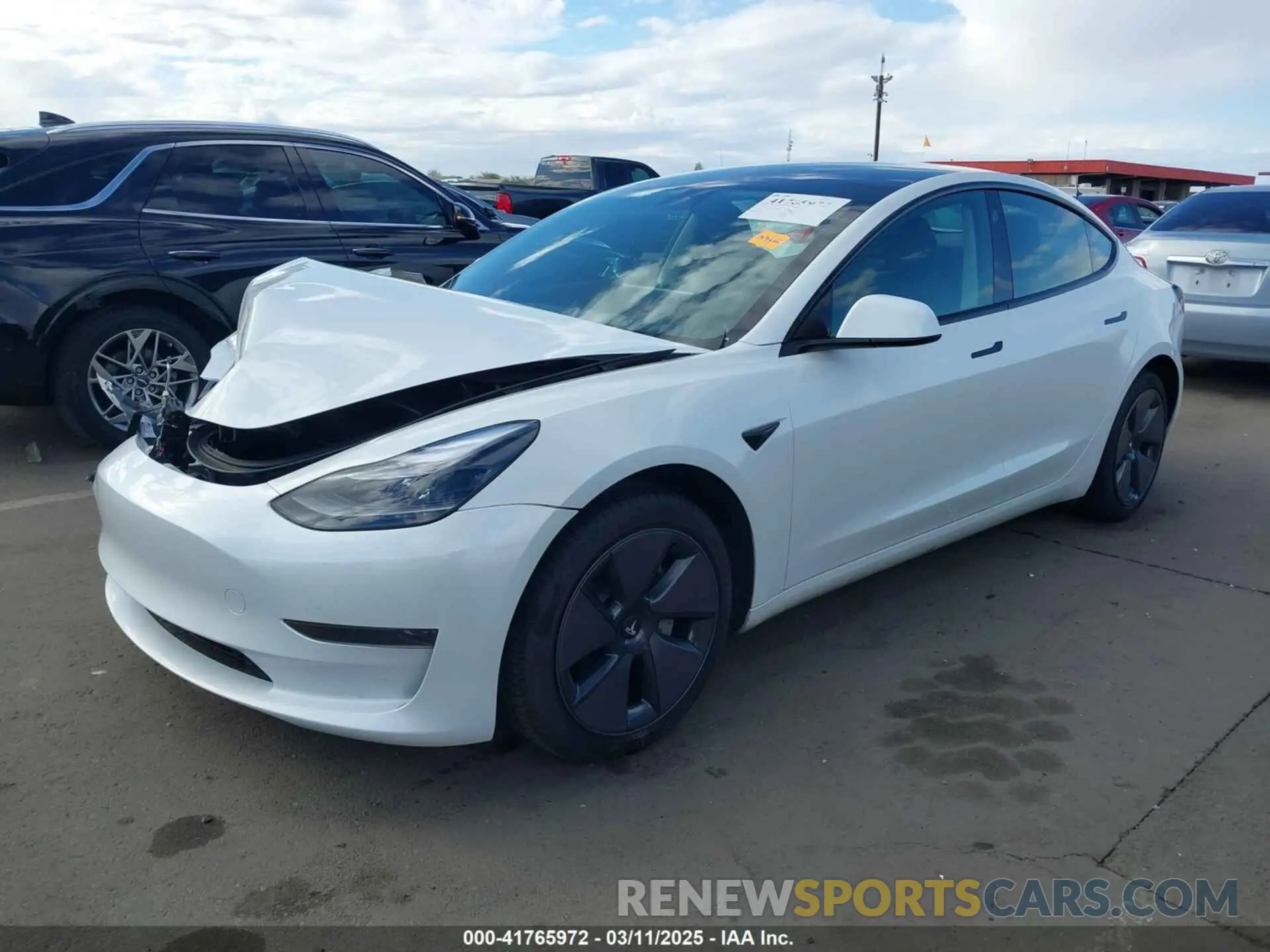 2 fotografías del automóvil dañado 5YJ3E1EA5PF554510 TESLA MODEL 3 2023