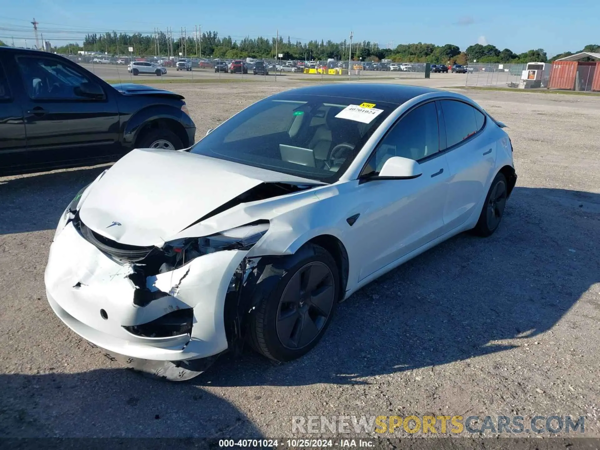 2 fotografías del automóvil dañado 5YJ3E1EA5PF575762 TESLA MODEL 3 2023