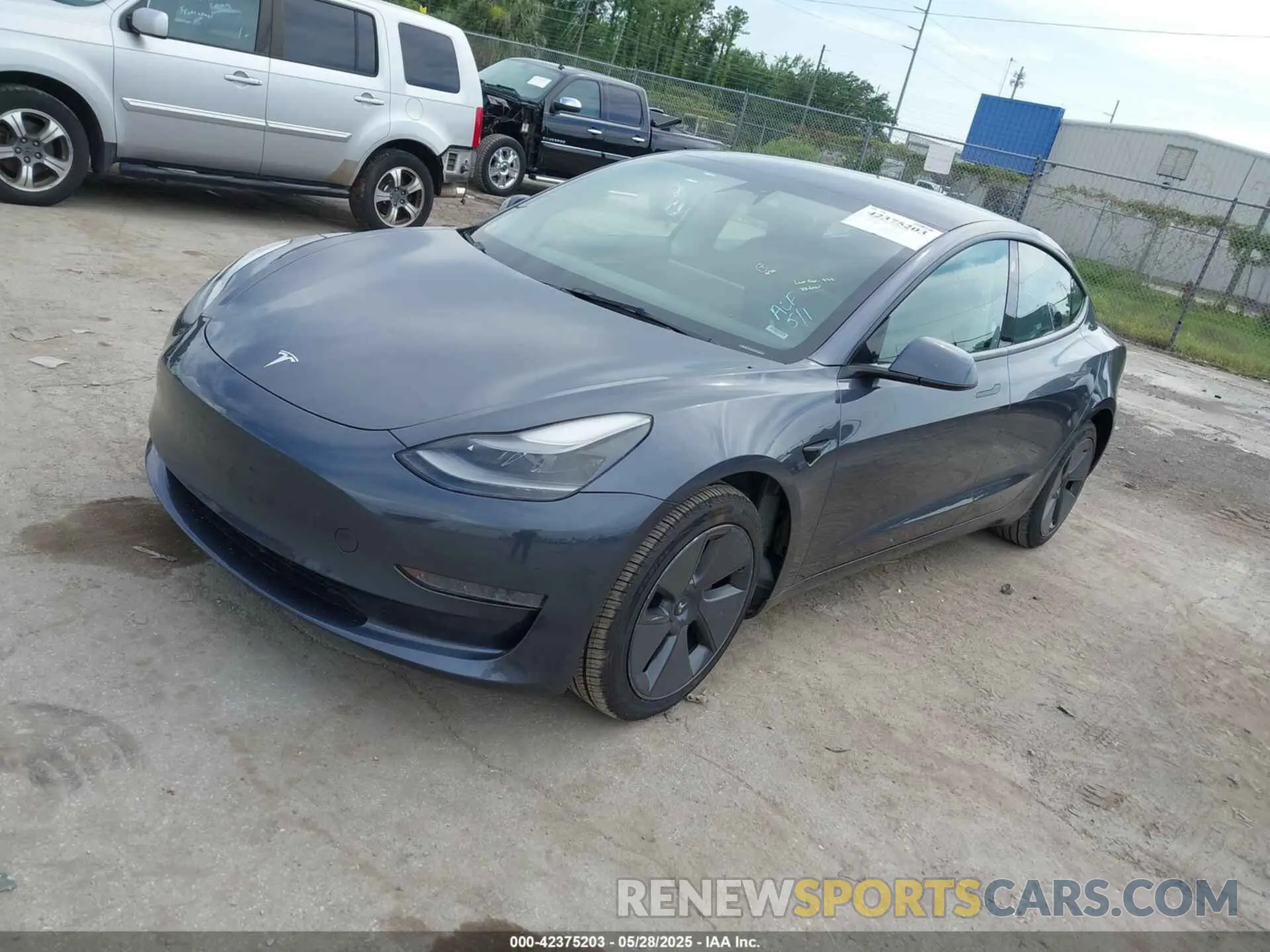 2 fotografías del automóvil dañado 5YJ3E1EA6PF435672 TESLA MODEL 3 2023