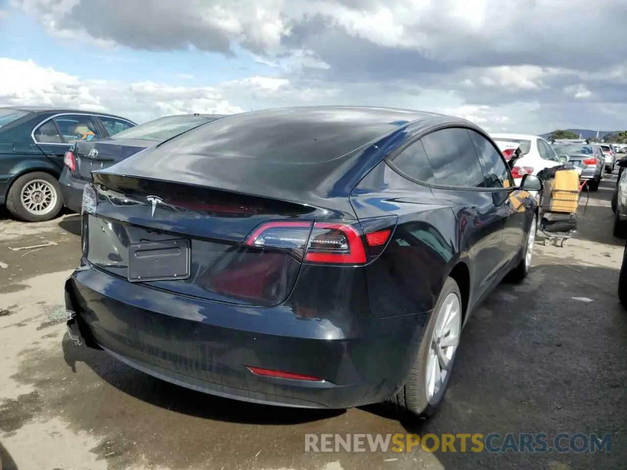 3 fotografías del automóvil dañado 5YJ3E1EA6PF490431 TESLA MODEL 3 2023