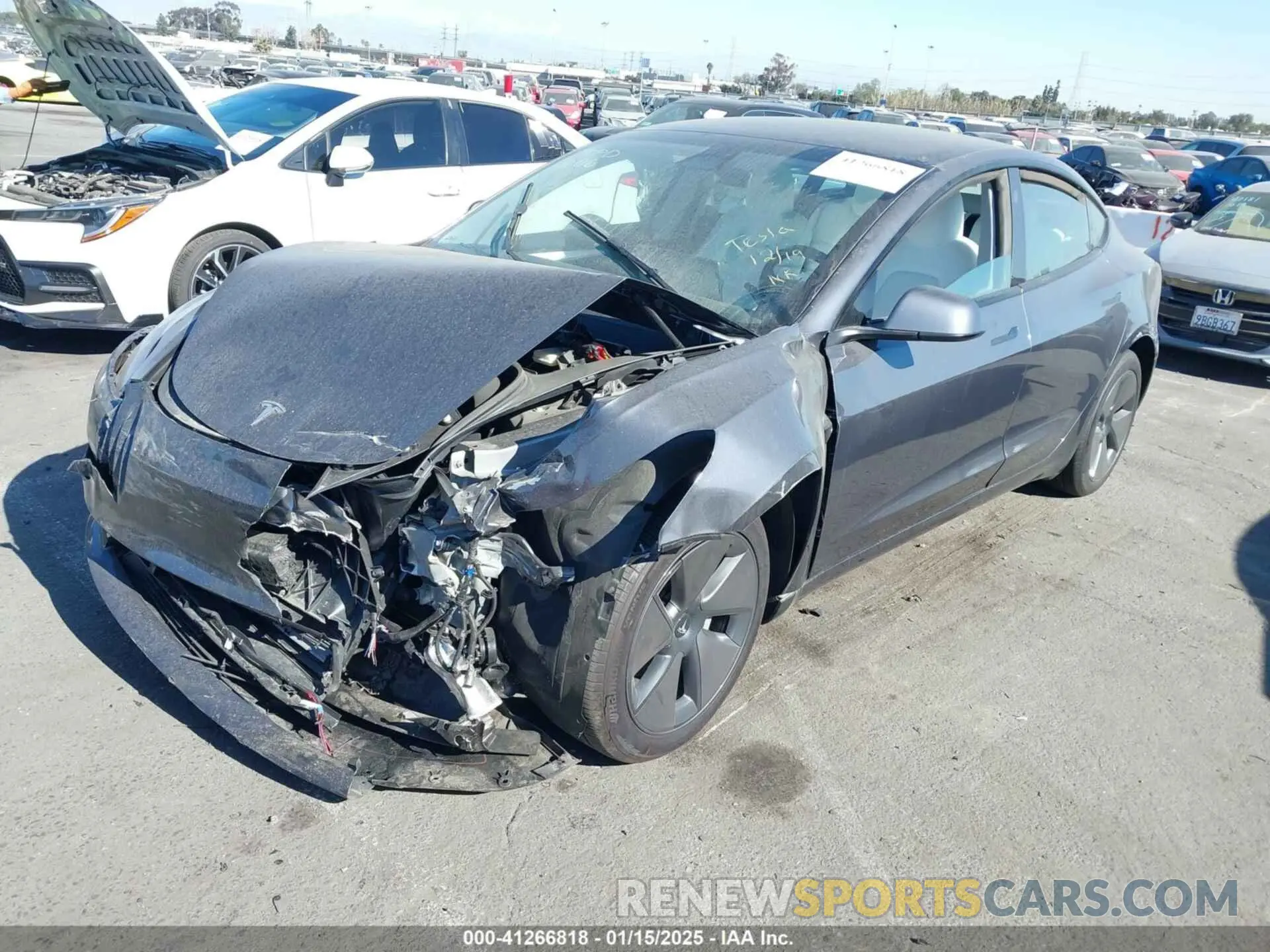 2 fotografías del automóvil dañado 5YJ3E1EA6PF698583 TESLA MODEL 3 2023