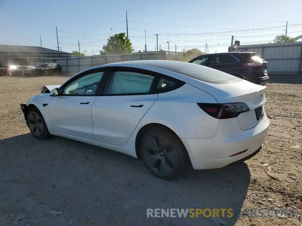 2 fotografías del automóvil dañado 5YJ3E1EA7PF393996 TESLA MODEL 3 2023