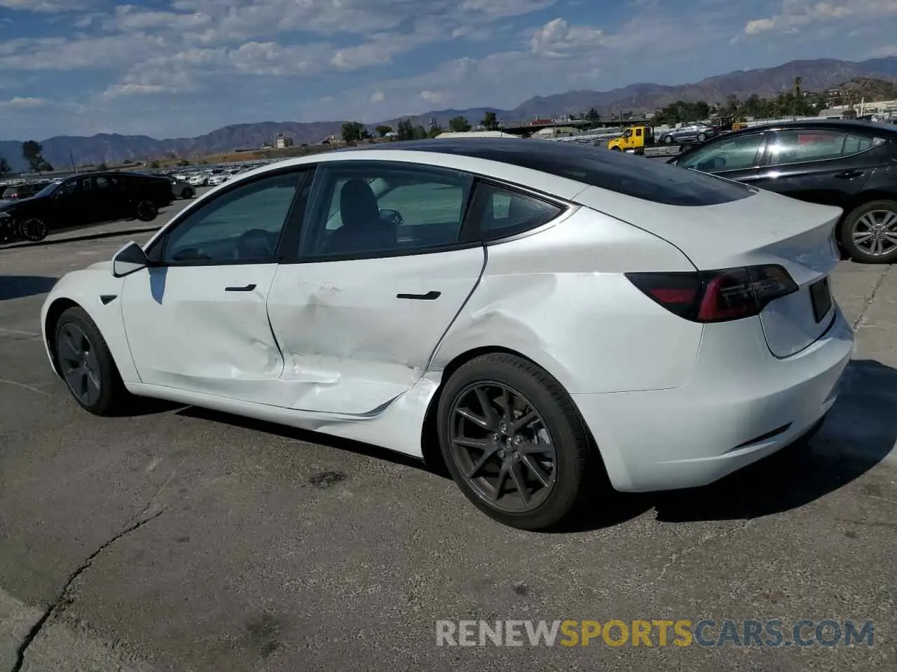 2 fotografías del automóvil dañado 5YJ3E1EA7PF397384 TESLA MODEL 3 2023