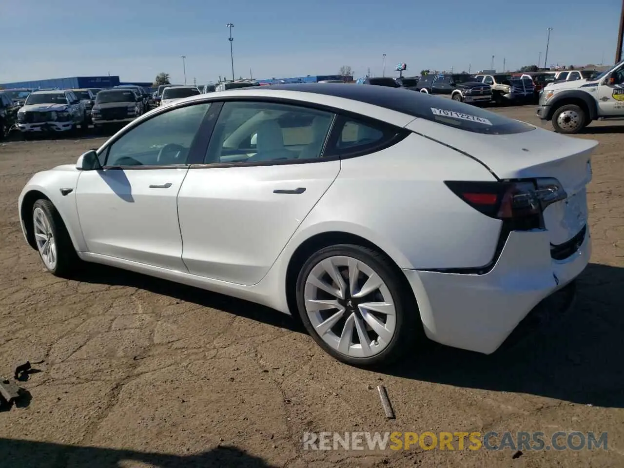 2 fotografías del automóvil dañado 5YJ3E1EA7PF414619 TESLA MODEL 3 2023