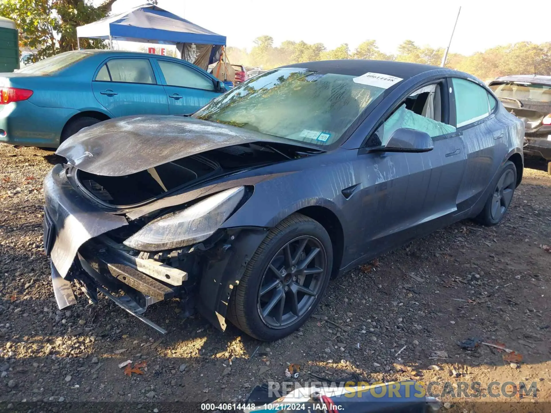 2 fotografías del automóvil dañado 5YJ3E1EA7PF458006 TESLA MODEL 3 2023