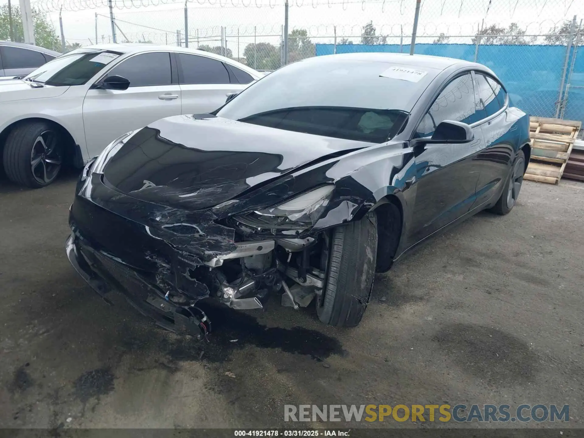 2 fotografías del automóvil dañado 5YJ3E1EA7PF473749 TESLA MODEL 3 2023