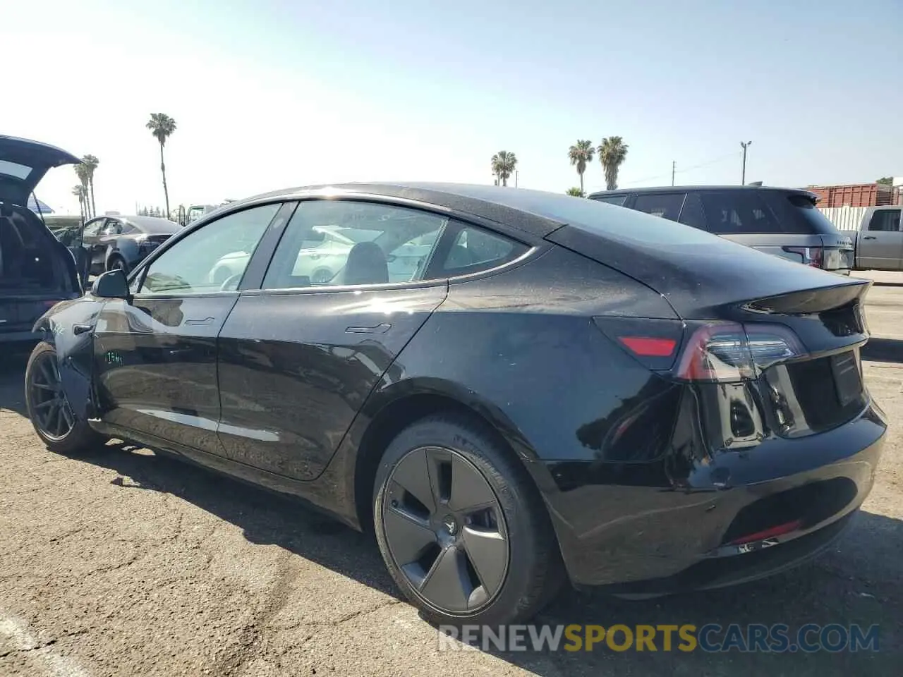 2 fotografías del automóvil dañado 5YJ3E1EA7PF576816 TESLA MODEL 3 2023