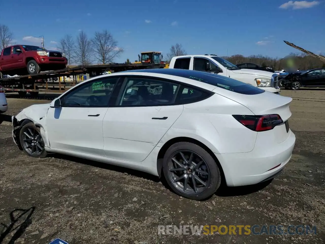 2 fotografías del automóvil dañado 5YJ3E1EA7PF578100 TESLA MODEL 3 2023