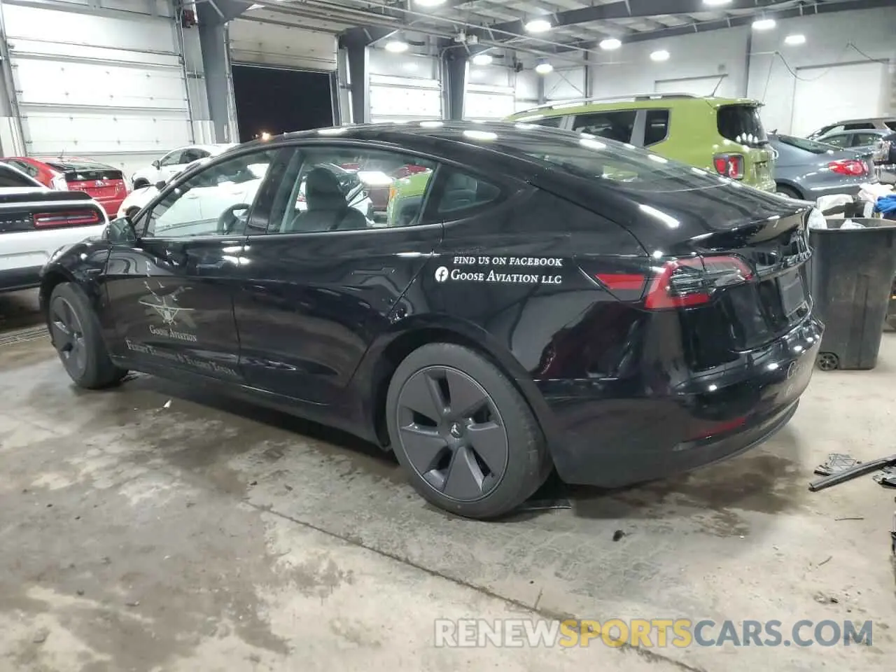 2 fotografías del automóvil dañado 5YJ3E1EA7PF604646 TESLA MODEL 3 2023