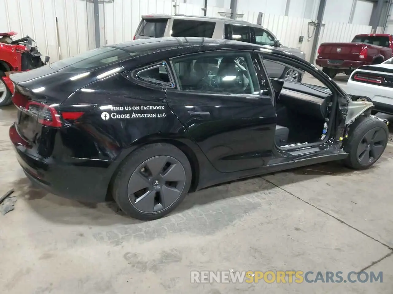 3 fotografías del automóvil dañado 5YJ3E1EA7PF604646 TESLA MODEL 3 2023
