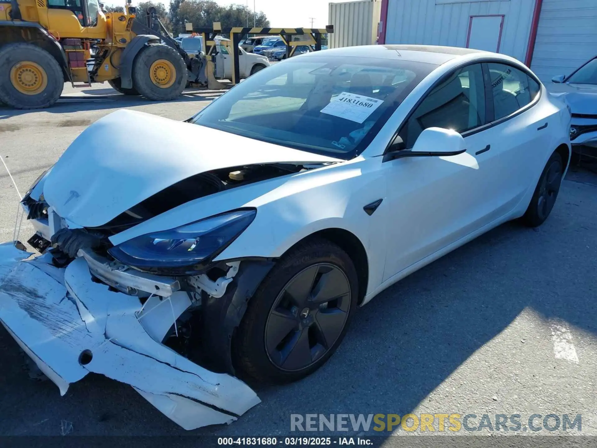 2 fotografías del automóvil dañado 5YJ3E1EA7PF693103 TESLA MODEL 3 2023