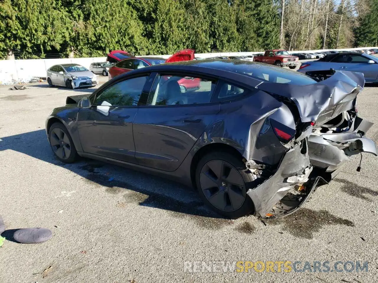 2 fotografías del automóvil dañado 5YJ3E1EA7PF693683 TESLA MODEL 3 2023