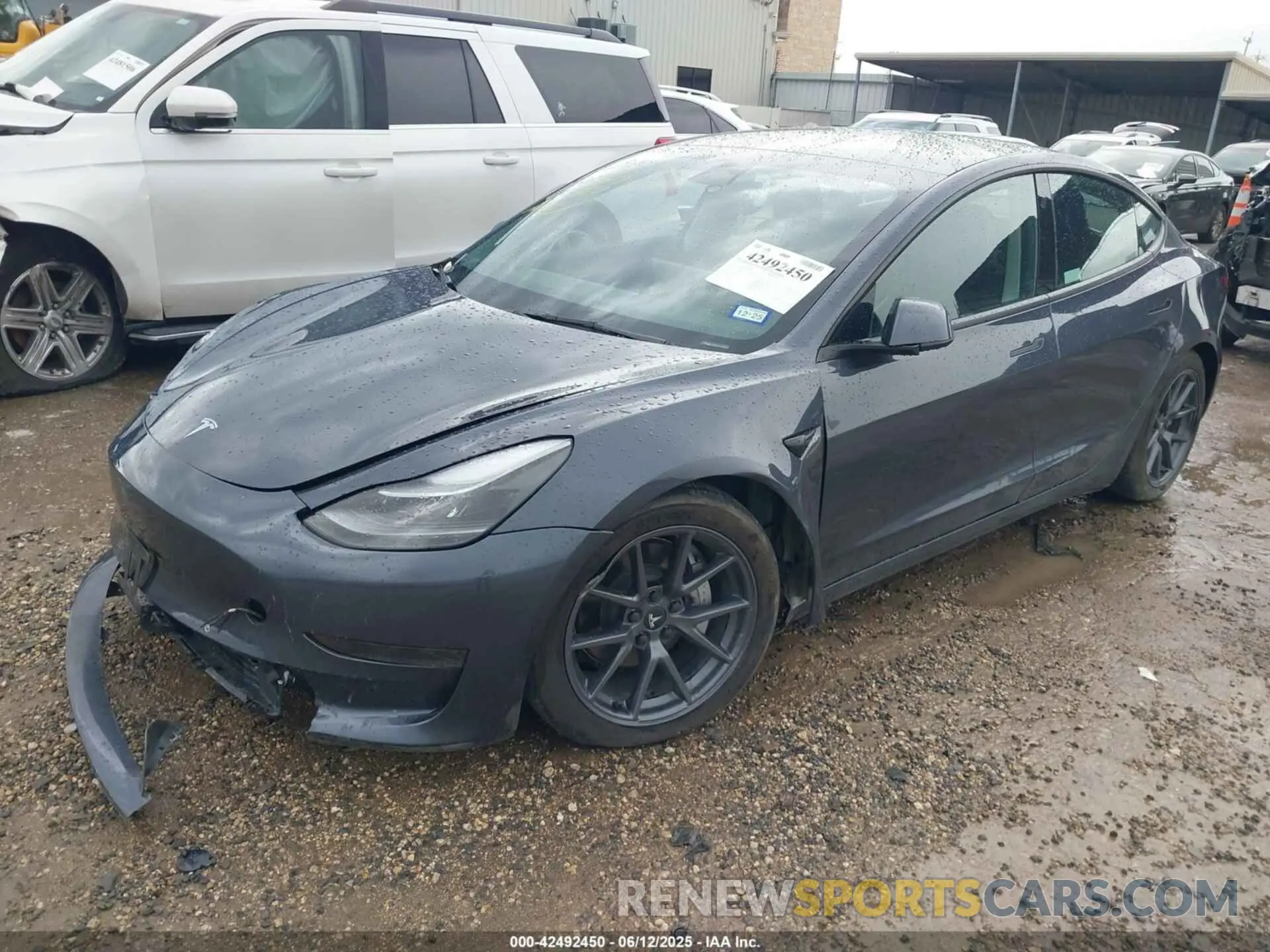 2 fotografías del automóvil dañado 5YJ3E1EA7PF701264 TESLA MODEL 3 2023