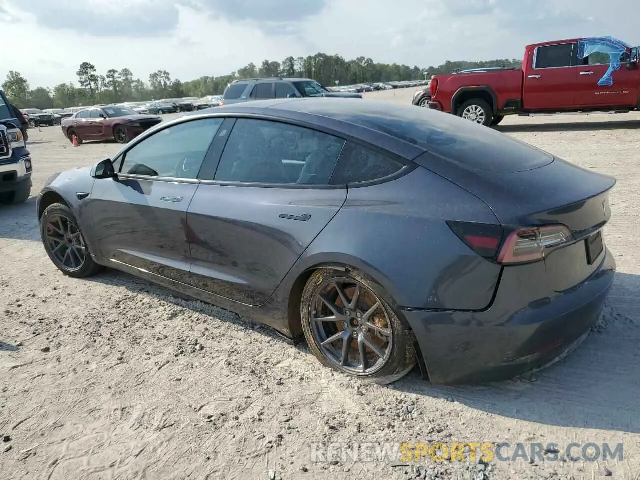 2 fotografías del automóvil dañado 5YJ3E1EA8PF426004 TESLA MODEL 3 2023