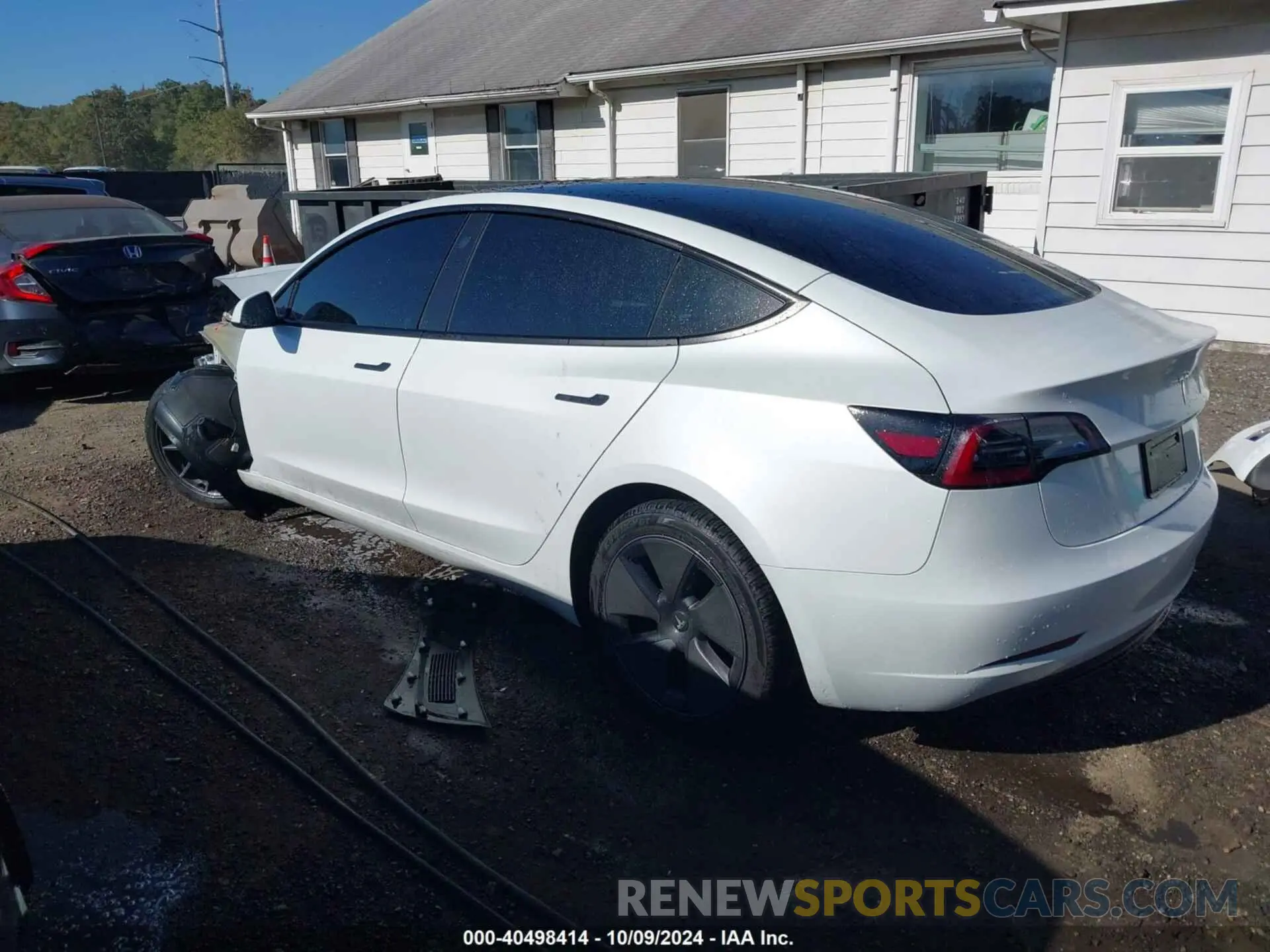 3 fotografías del automóvil dañado 5YJ3E1EA8PF581801 TESLA MODEL 3 2023