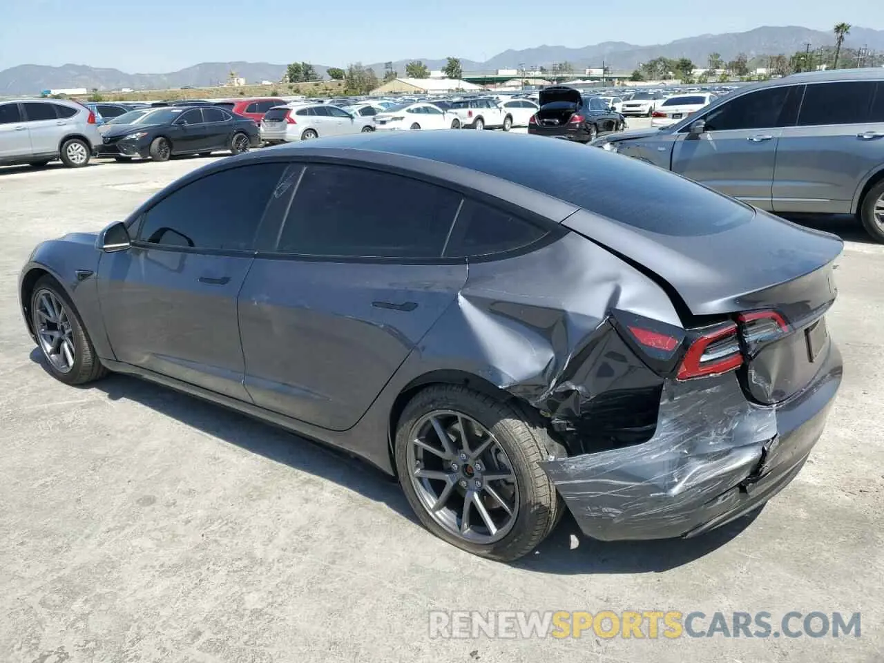 2 fotografías del automóvil dañado 5YJ3E1EA8PF616210 TESLA MODEL 3 2023