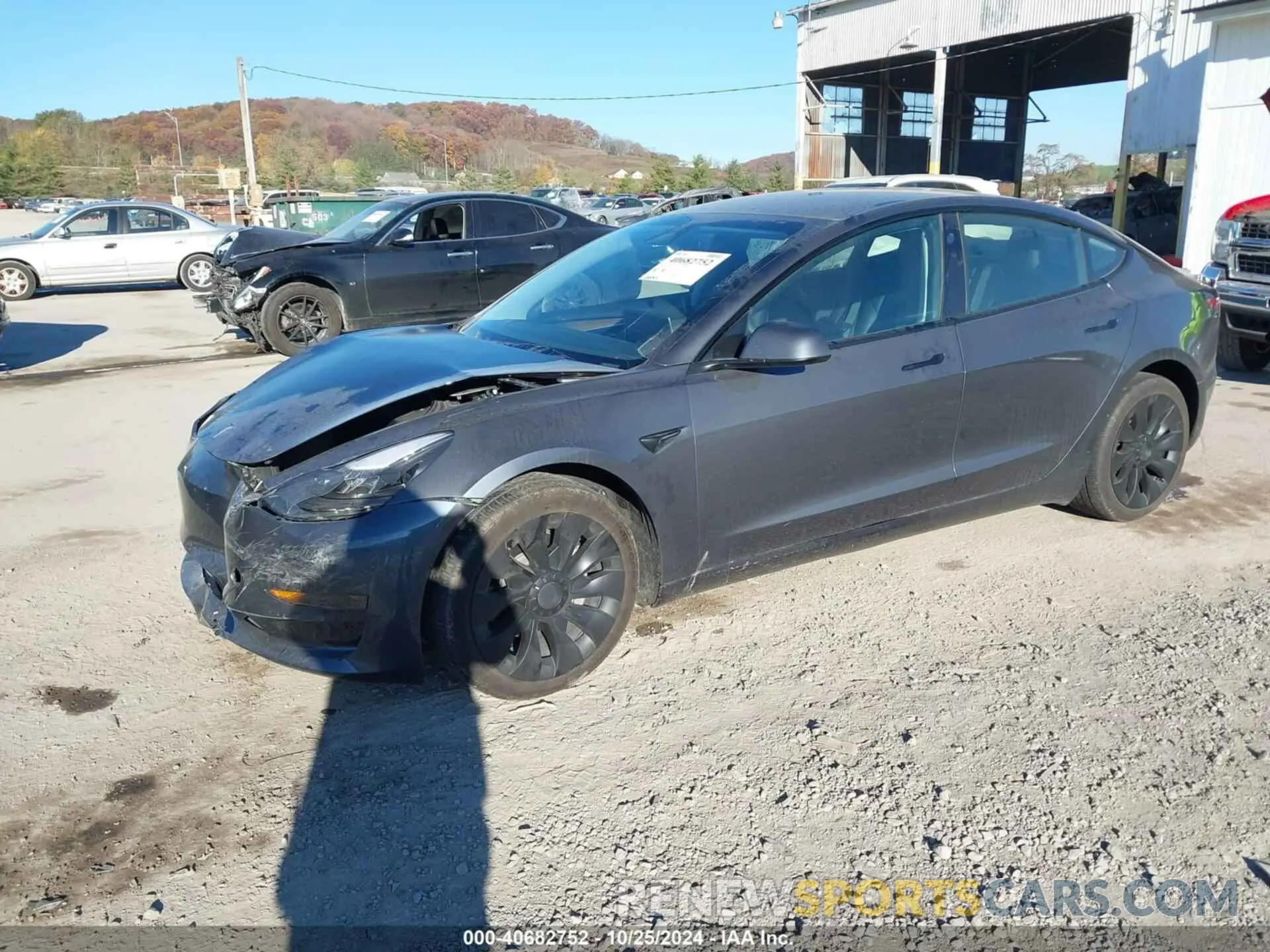 2 fotografías del automóvil dañado 5YJ3E1EA9PF404061 TESLA MODEL 3 2023
